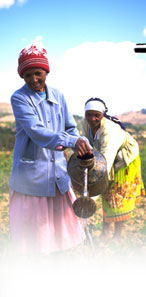 women tending field