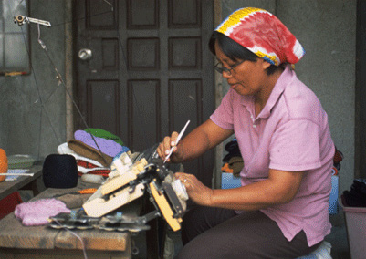 woman at textile machine